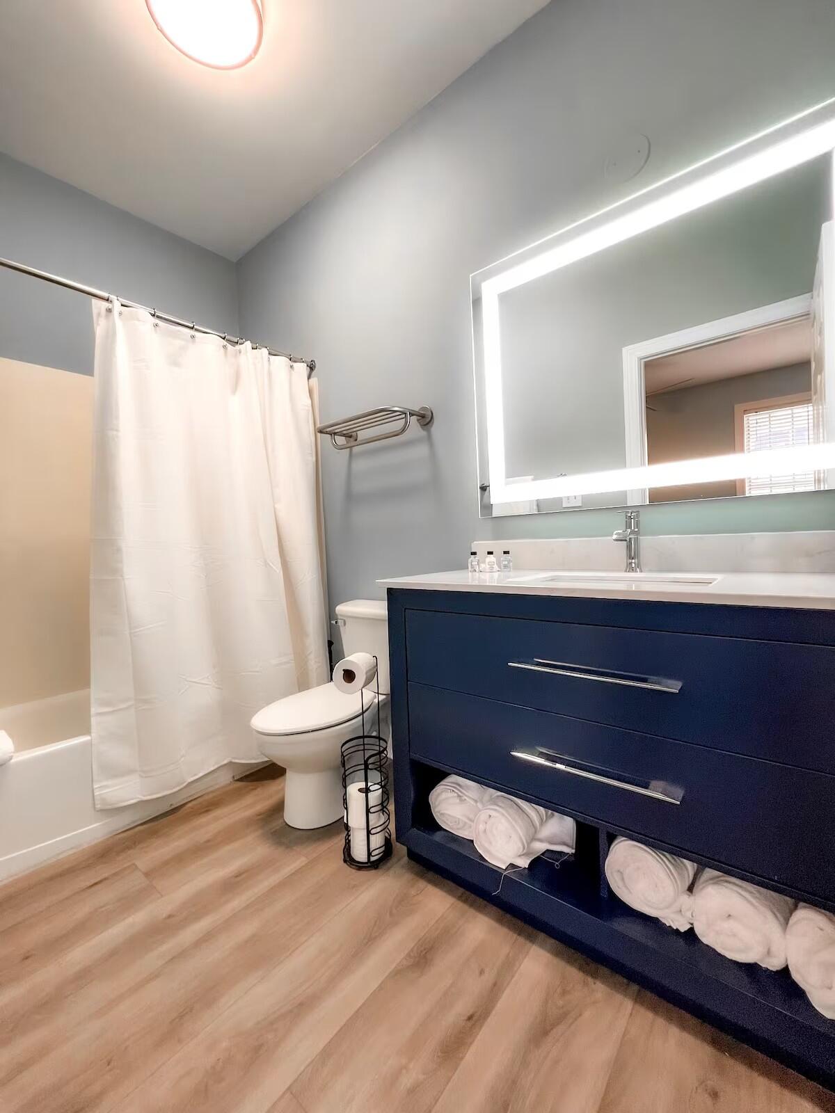 10343 East County Highway 30A, Unit B275 Inlet Beach, FL 32413 - Photo 8 of 25 a bathroom with a sink a toilet and mirror