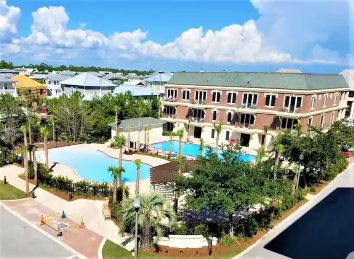 10343 East County Highway 30A, Unit B275 Inlet Beach, FL 32413 - Photo 9 of 25 an aerial view of a house with a yard basket ball court and outdoor seating