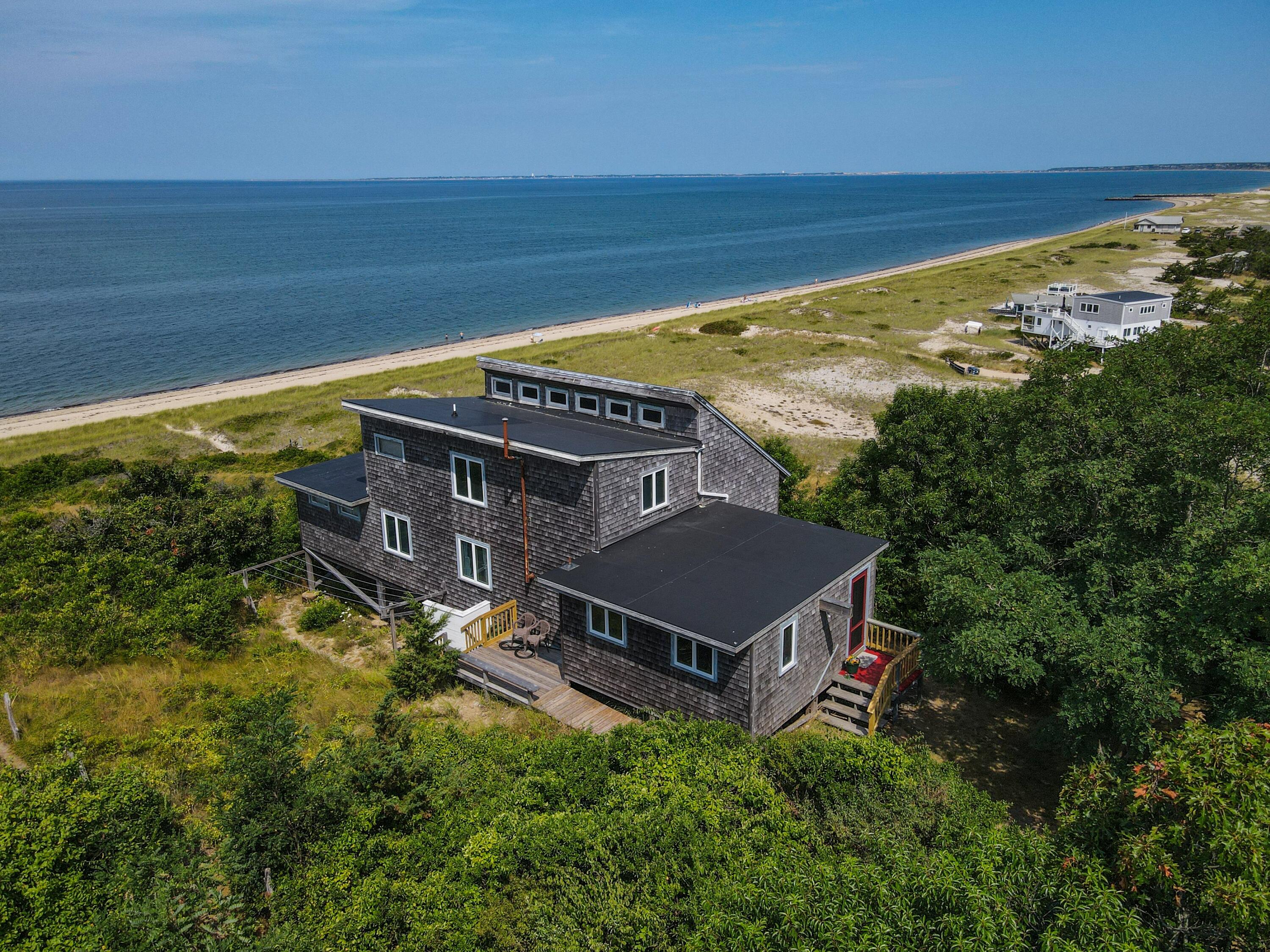 a view of a house with a ocean view