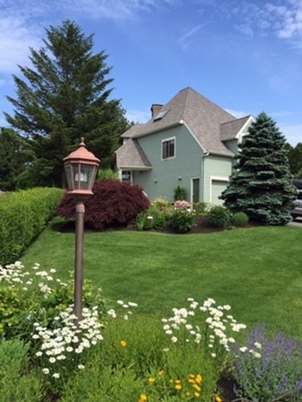 17 McKinley Road Marblehead, MA 01945 - Photo 1 of 22 a front view of house with yard and green space