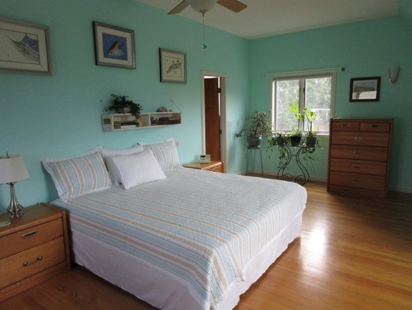 17 McKinley Road Marblehead, MA 01945 - Photo 11 of 22 a bedroom with bed and cabinet