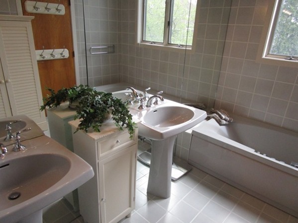 17 McKinley Road Marblehead, MA 01945 - Photo 12 of 22 a bathroom with a sink and a mirror