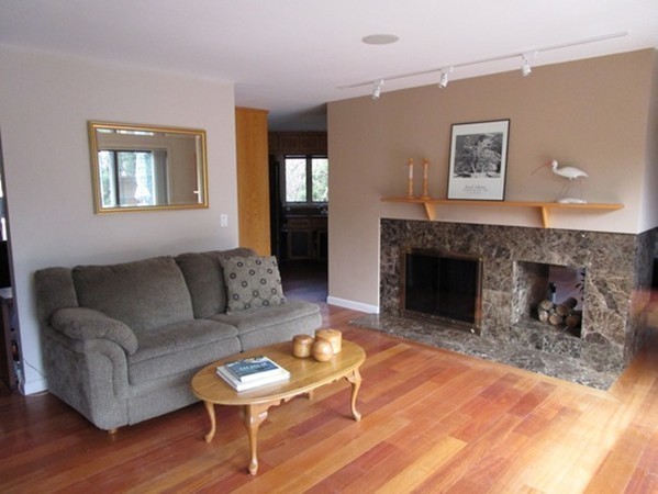 17 McKinley Road Marblehead, MA 01945 - Photo 7 of 22 a living room with furniture and a fireplace