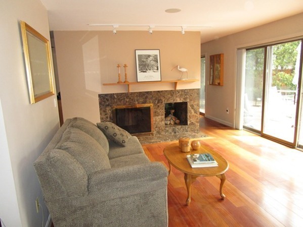 17 McKinley Road Marblehead, MA 01945 - Photo 8 of 22 a living room with furniture and a fireplace