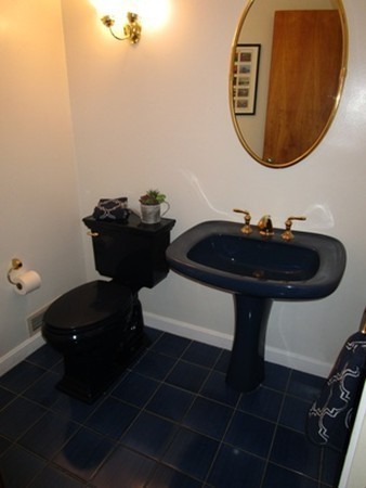 17 McKinley Road Marblehead, MA 01945 - Photo 10 of 22 a bathroom with a sink and a mirror