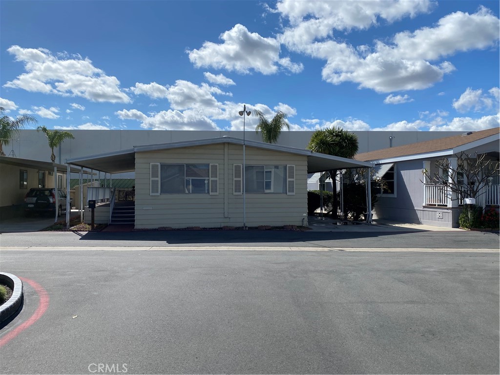 45 Walnut Via Anaheim, CA 92801 - Photo 1 of 14 a view of a house with a patio