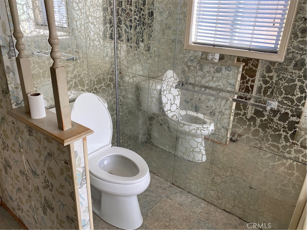 45 Walnut Via Anaheim, CA 92801 - Photo 12 of 14 a bathroom with a toilet and a sink