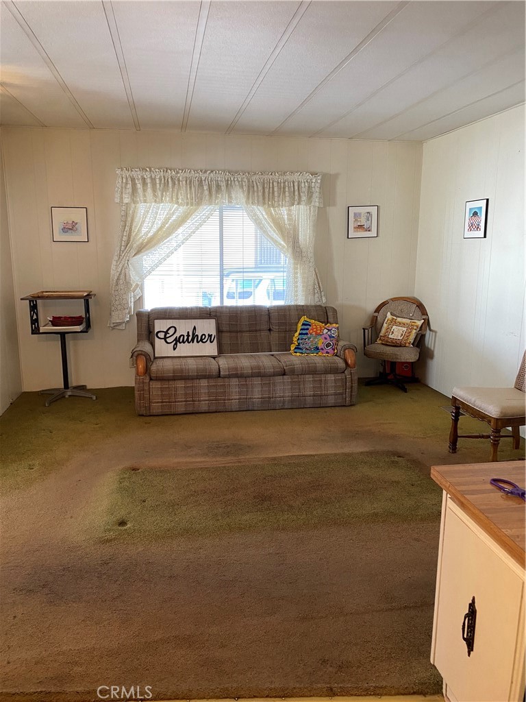 45 Walnut Via Anaheim, CA 92801 - Photo 3 of 14 a living room with furniture and a window