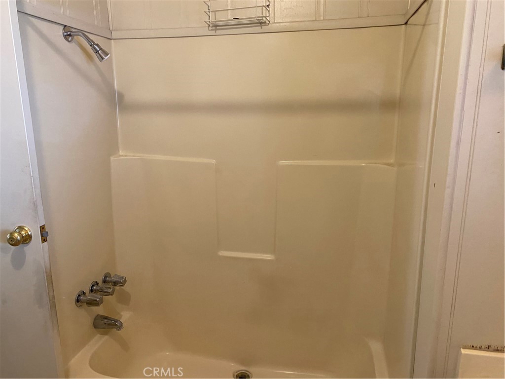 45 Walnut Via Anaheim, CA 92801 - Photo 6 of 14 a bathroom with a shower