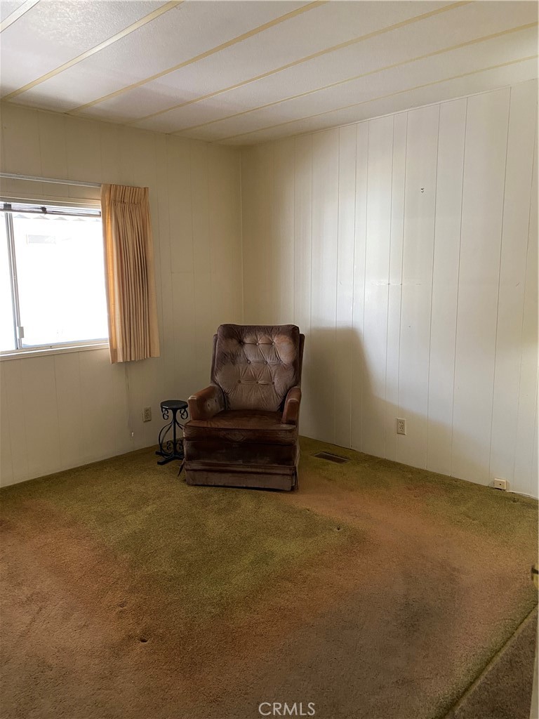 45 Walnut Via Anaheim, CA 92801 - Photo 7 of 14 a living room with furniture and a window