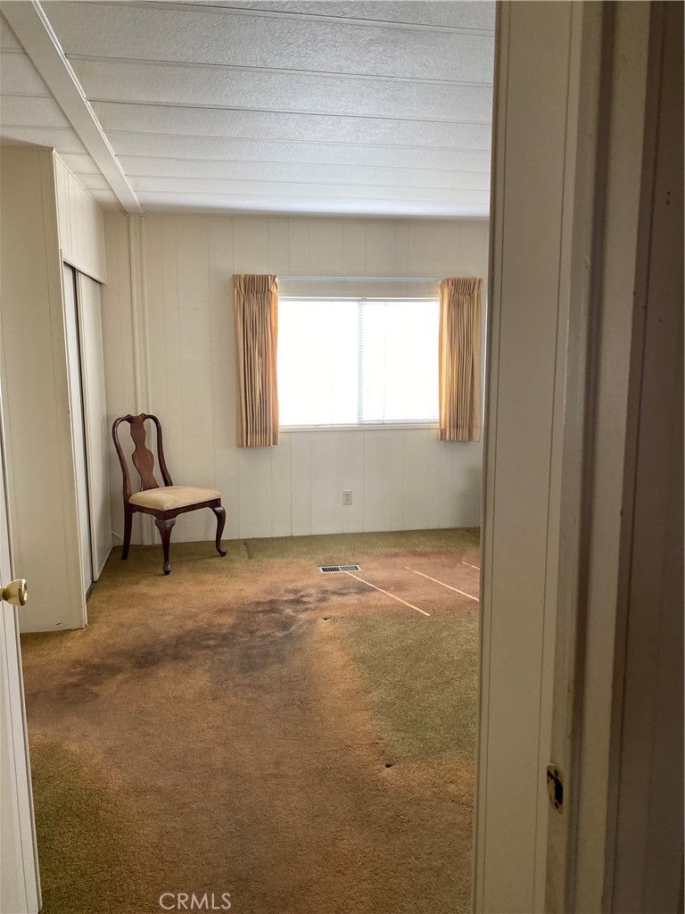 45 Walnut Via Anaheim, CA 92801 - Photo 8 of 14 a view of a room with a window and furniture