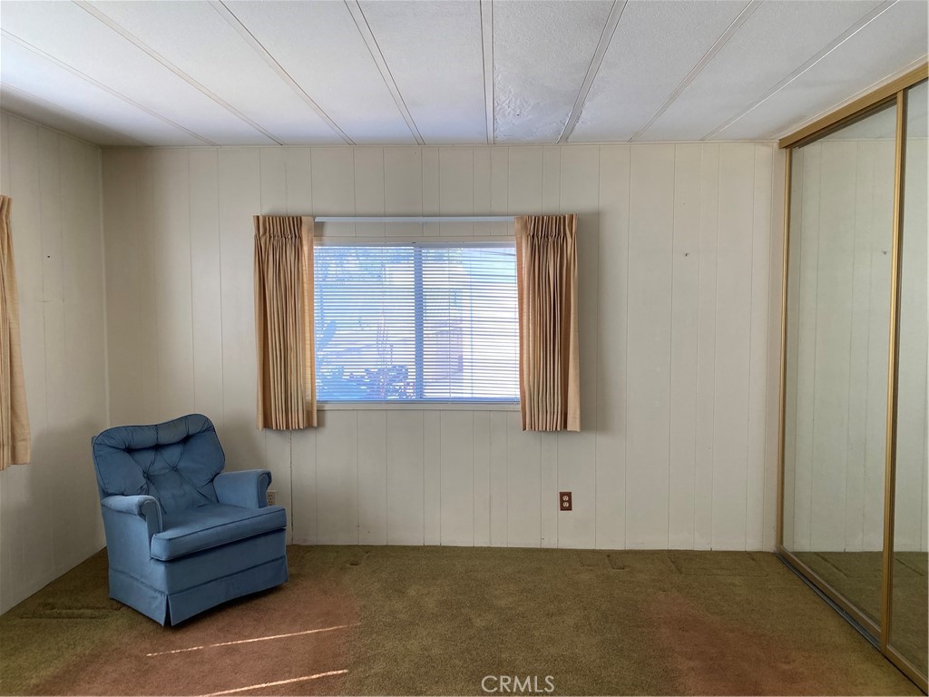 45 Walnut Via Anaheim, CA 92801 - Photo 9 of 14 a living room with furniture and a window