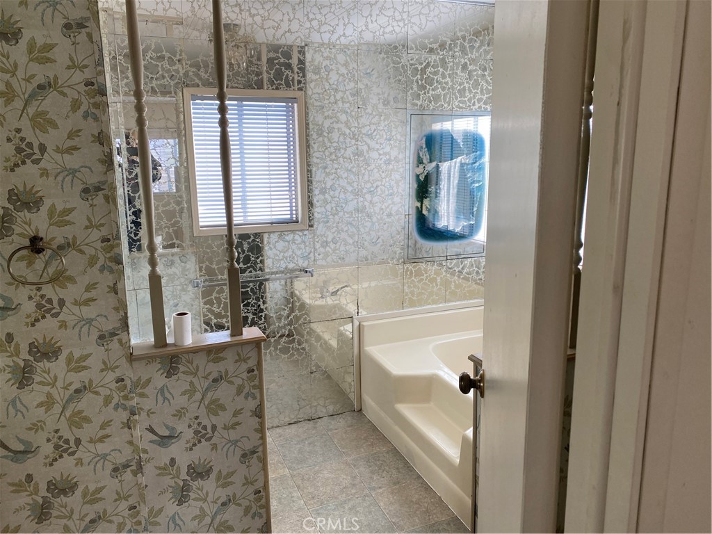 45 Walnut Via Anaheim, CA 92801 - Photo 10 of 14 a bathroom with a shower