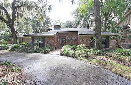 9628 Beauclerc Bluff Road Jacksonville, FL 32257 - Photo 1 of 31 front view of a house with a yard