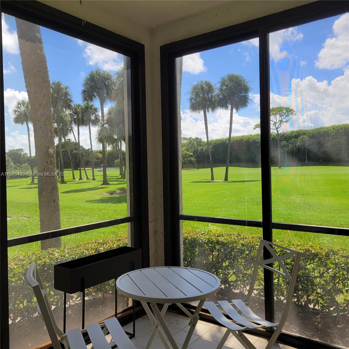 7896 Seville Place, Unit 1501 Boca Raton, FL 33433 - Photo 5 of 9 a view of a room with a large window