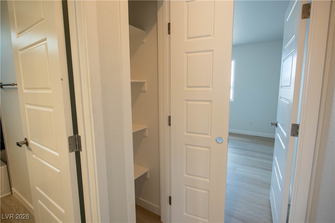 3897 North Mayfield Ranch Road Pahrump, NV 89060 - Photo 17 of 28 Closet in between the two Guest Bedrooms