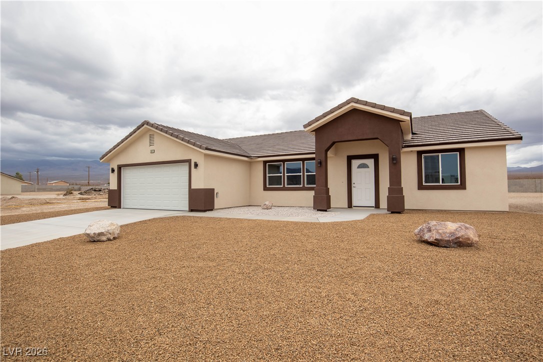3897 North Mayfield Ranch Road Pahrump, NV 89060 - Photo 2 of 28 Front of the House from the Right