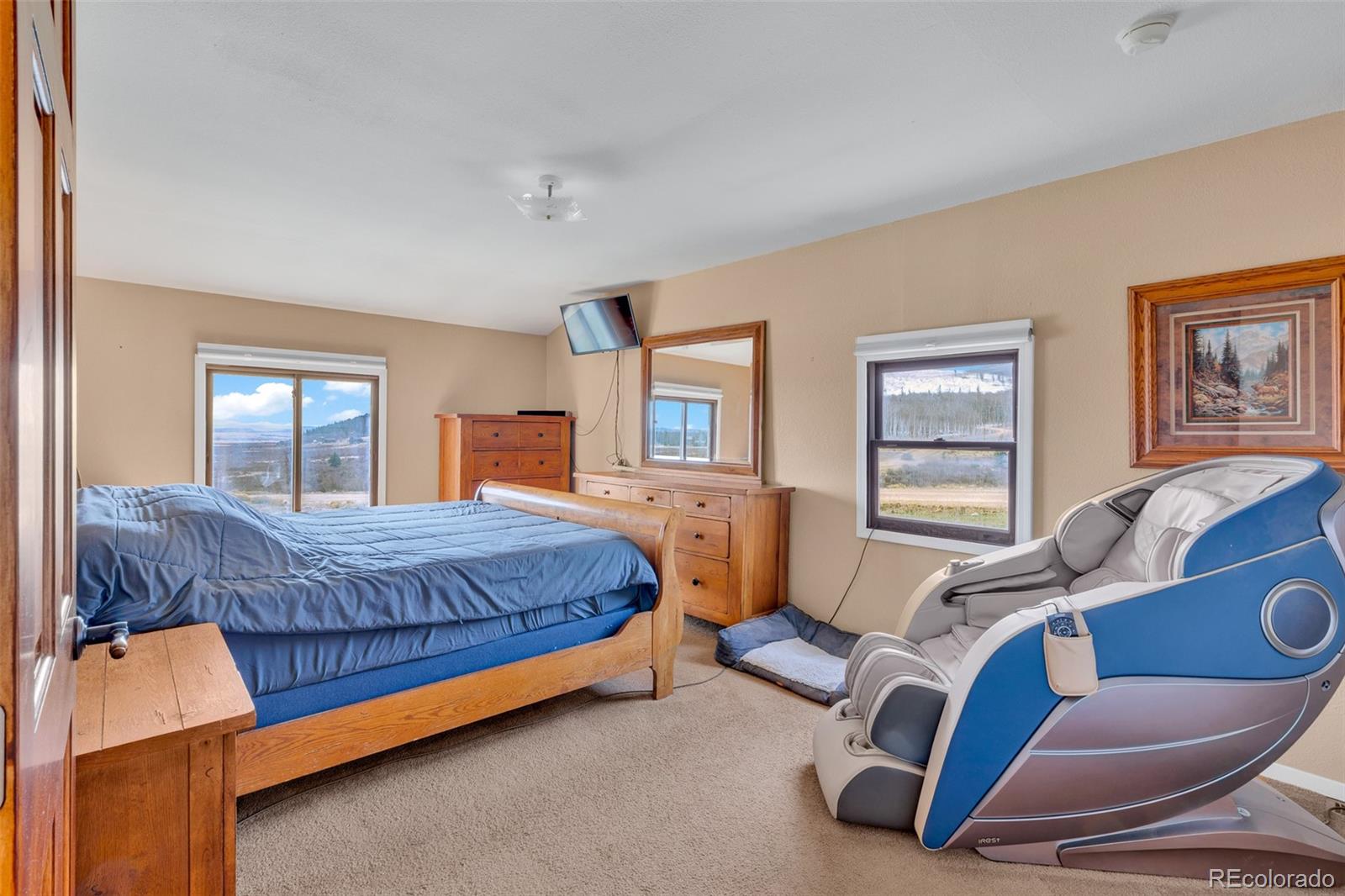 37 Warm Springs Road Fairplay, CO 80440 - Photo 19 of 50 a bedroom with a bed and a window