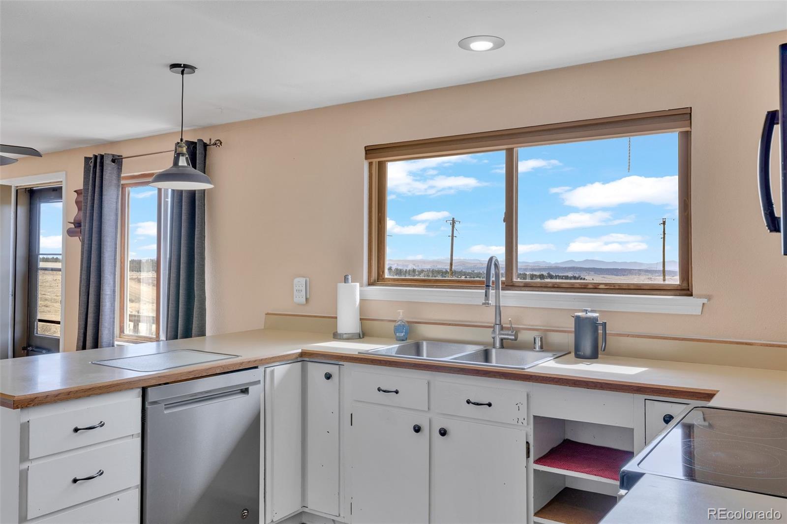 37 Warm Springs Road Fairplay, CO 80440 - Photo 22 of 50 a kitchen with a sink and a window