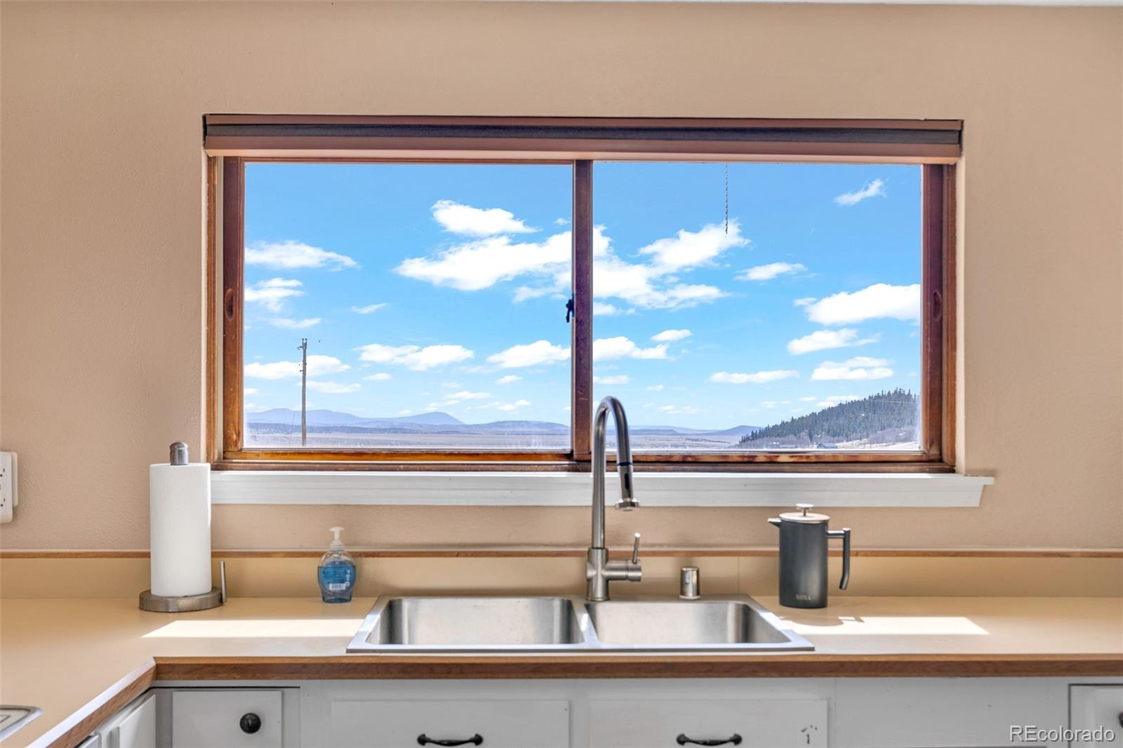 37 Warm Springs Road Fairplay, CO 80440 - Photo 23 of 50 a bathroom sink with a view of window