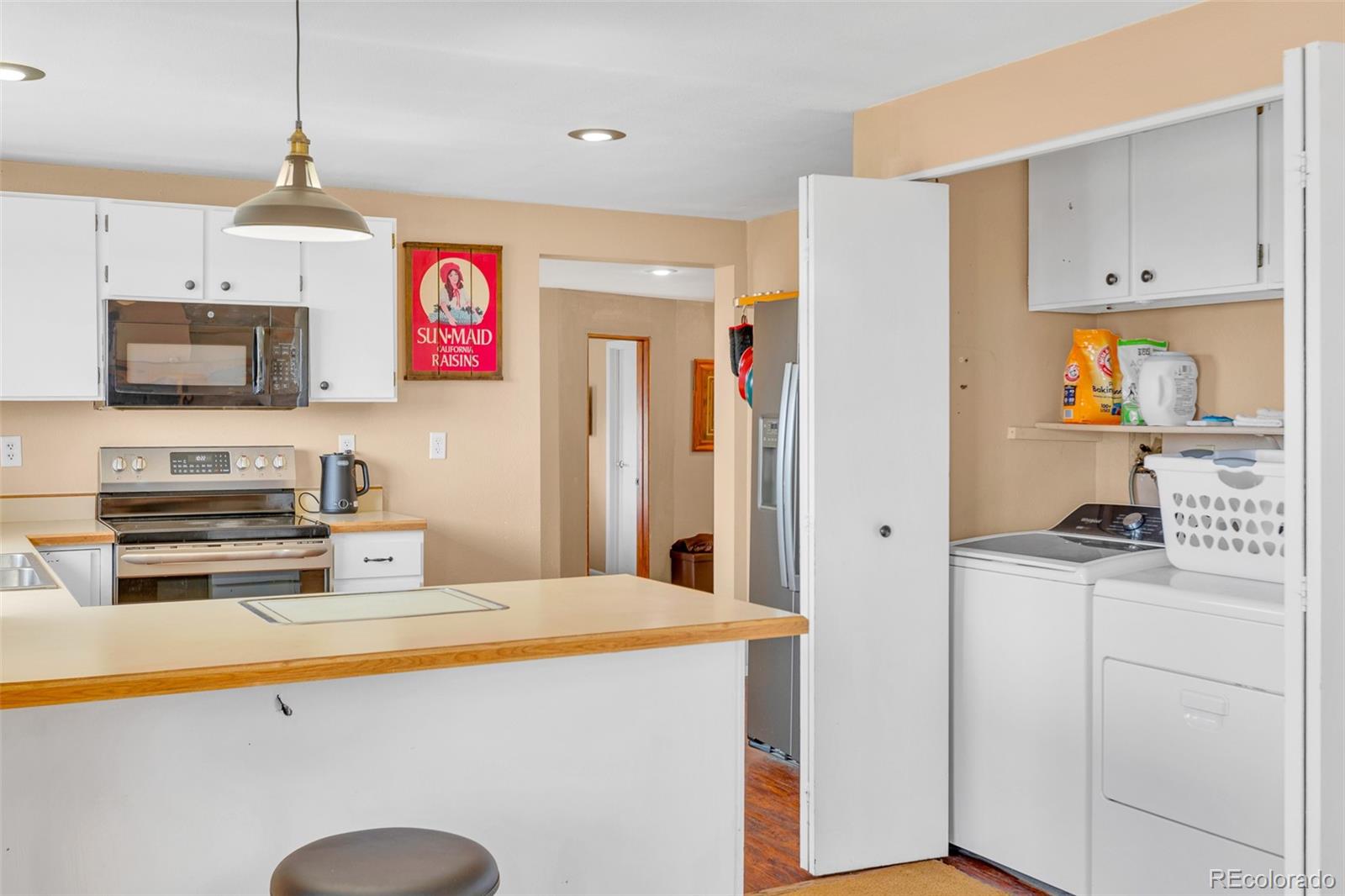 37 Warm Springs Road Fairplay, CO 80440 - Photo 25 of 50 a kitchen with stainless steel appliances granite countertop a sink stove and refrigerator