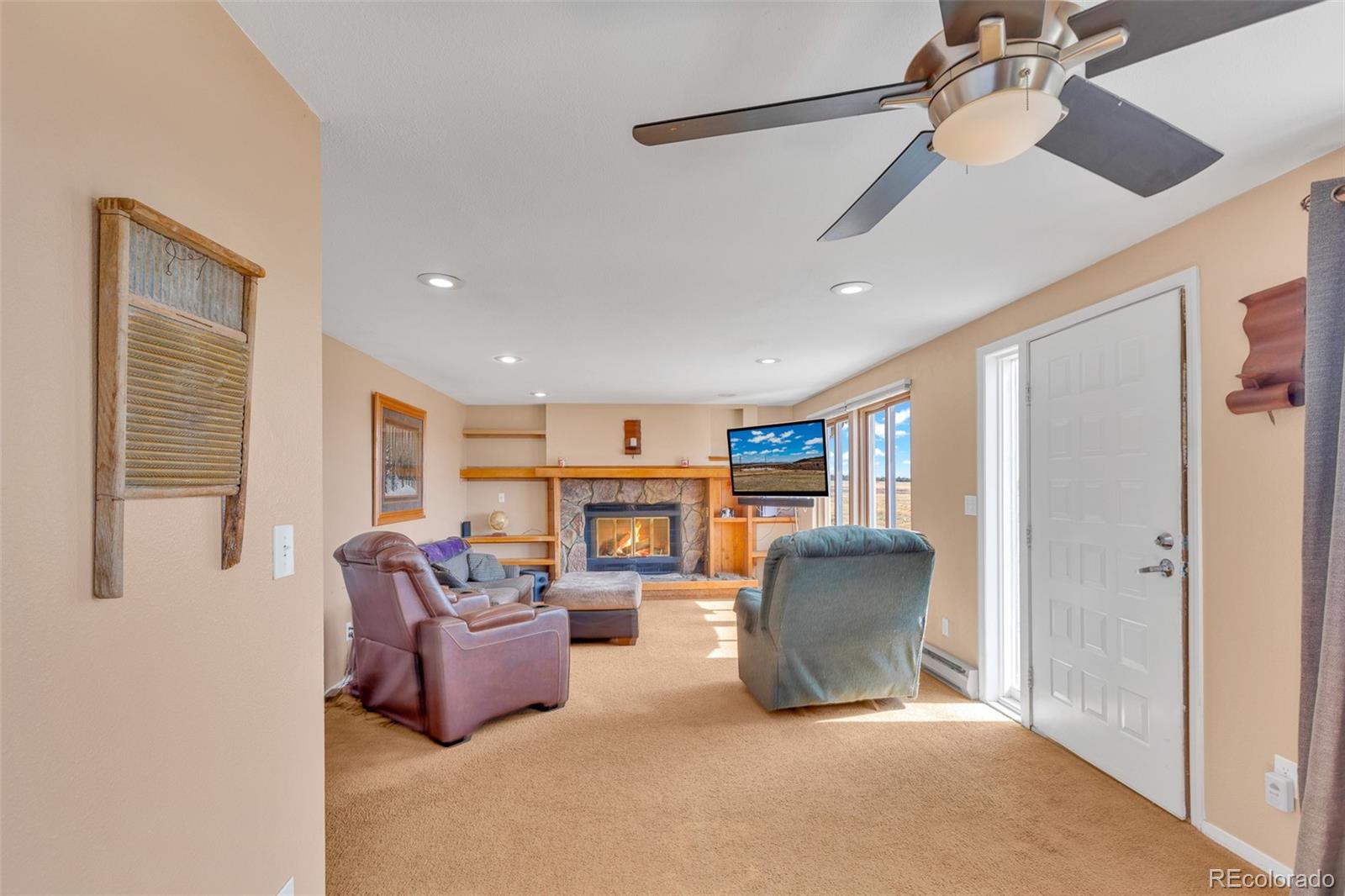 37 Warm Springs Road Fairplay, CO 80440 - Photo 28 of 50 a living room with furniture and a ceiling fan