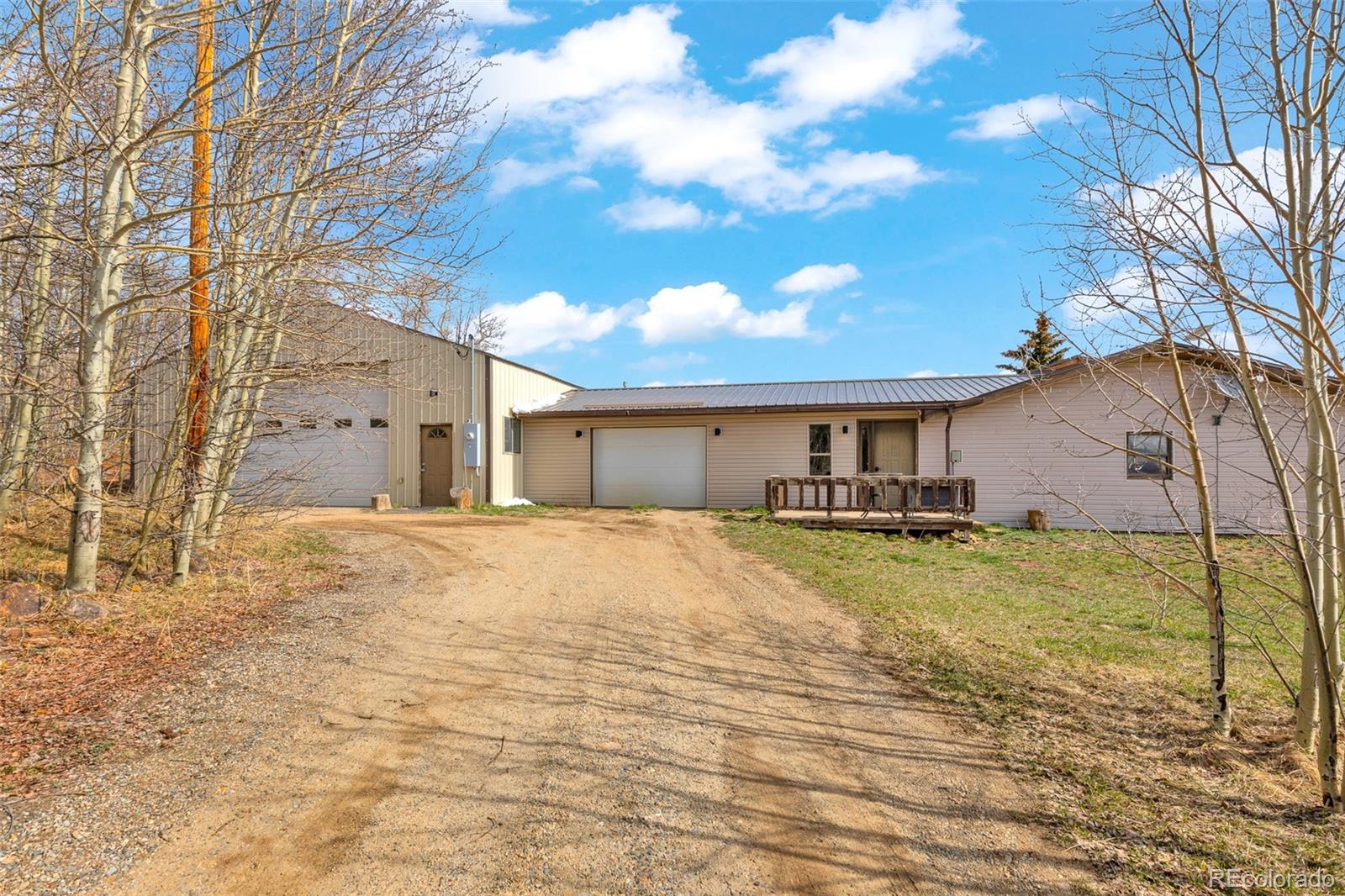 37 Warm Springs Road Fairplay, CO 80440 - Photo 37 of 50 a view of a house with a yard