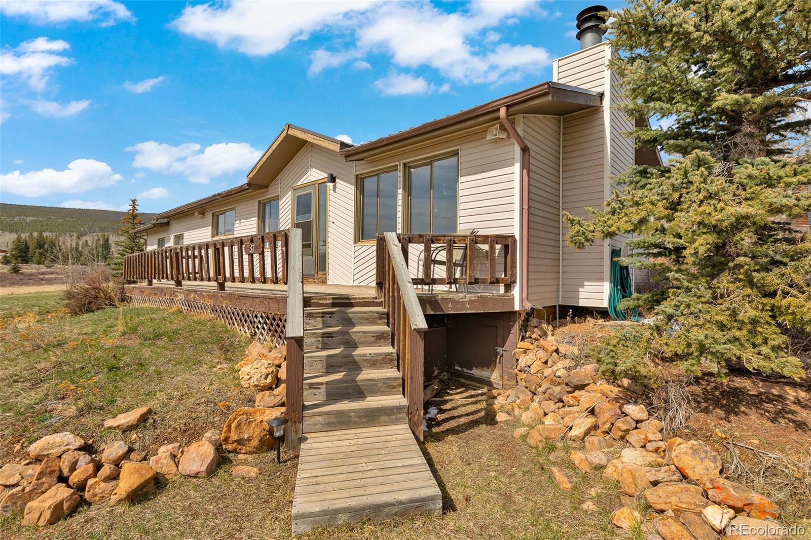 37 Warm Springs Road Fairplay, CO 80440 - Photo 10 of 50 a view of house with a yard
