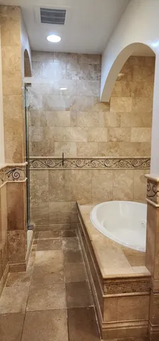 a bathroom with a bathtub