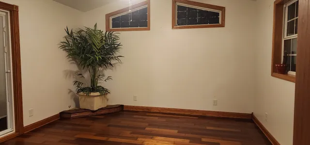 a view of entryway with wooden floor