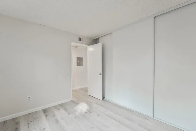 a view of a room that has a window in it