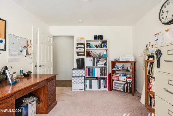 a room with furniture and a book shelf