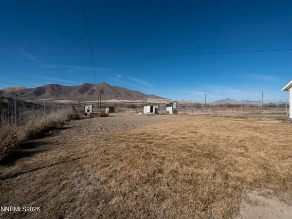a view of a road with an ocean view