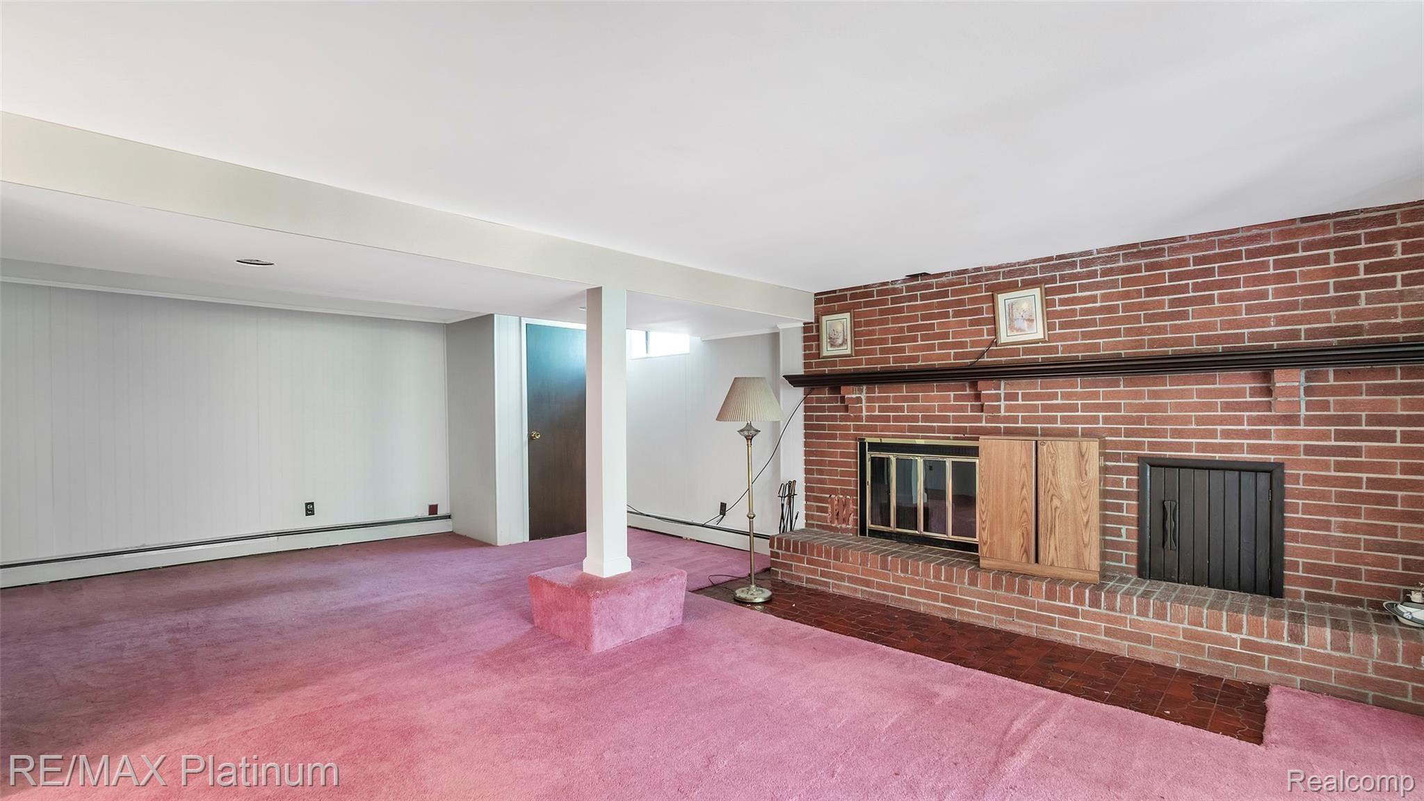 2966 Swarthout Road Pinckney, MI 48169 - Photo 24 of 42 Finished Family Room With Fireplace In Basement