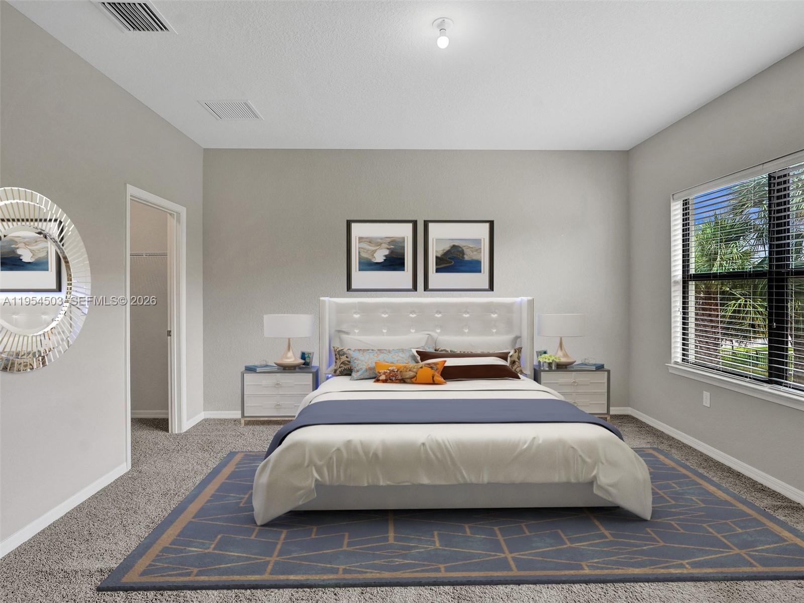 8330 Rearing Lane Lake Worth, FL 33467 - Photo 13 of 39 a bedroom with a bed and window