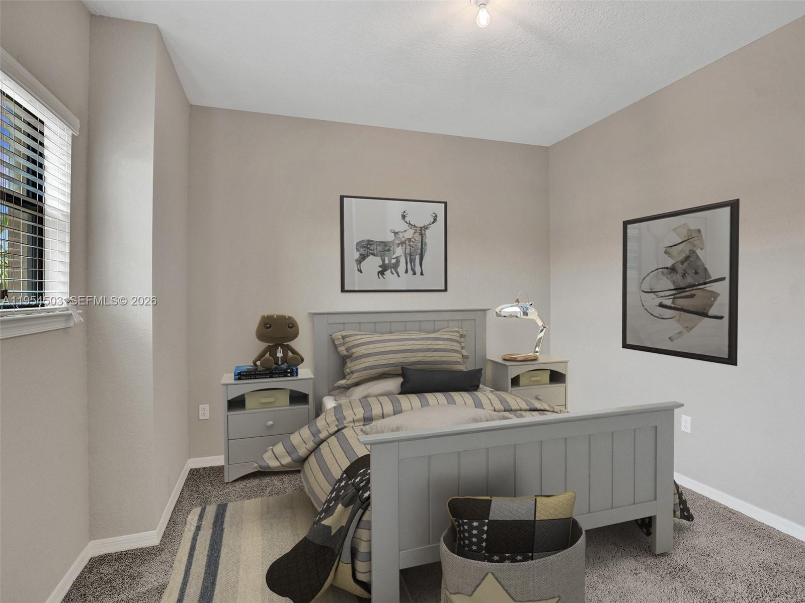 8330 Rearing Lane Lake Worth, FL 33467 - Photo 20 of 39 a view of a room that has a couch and a chair in it