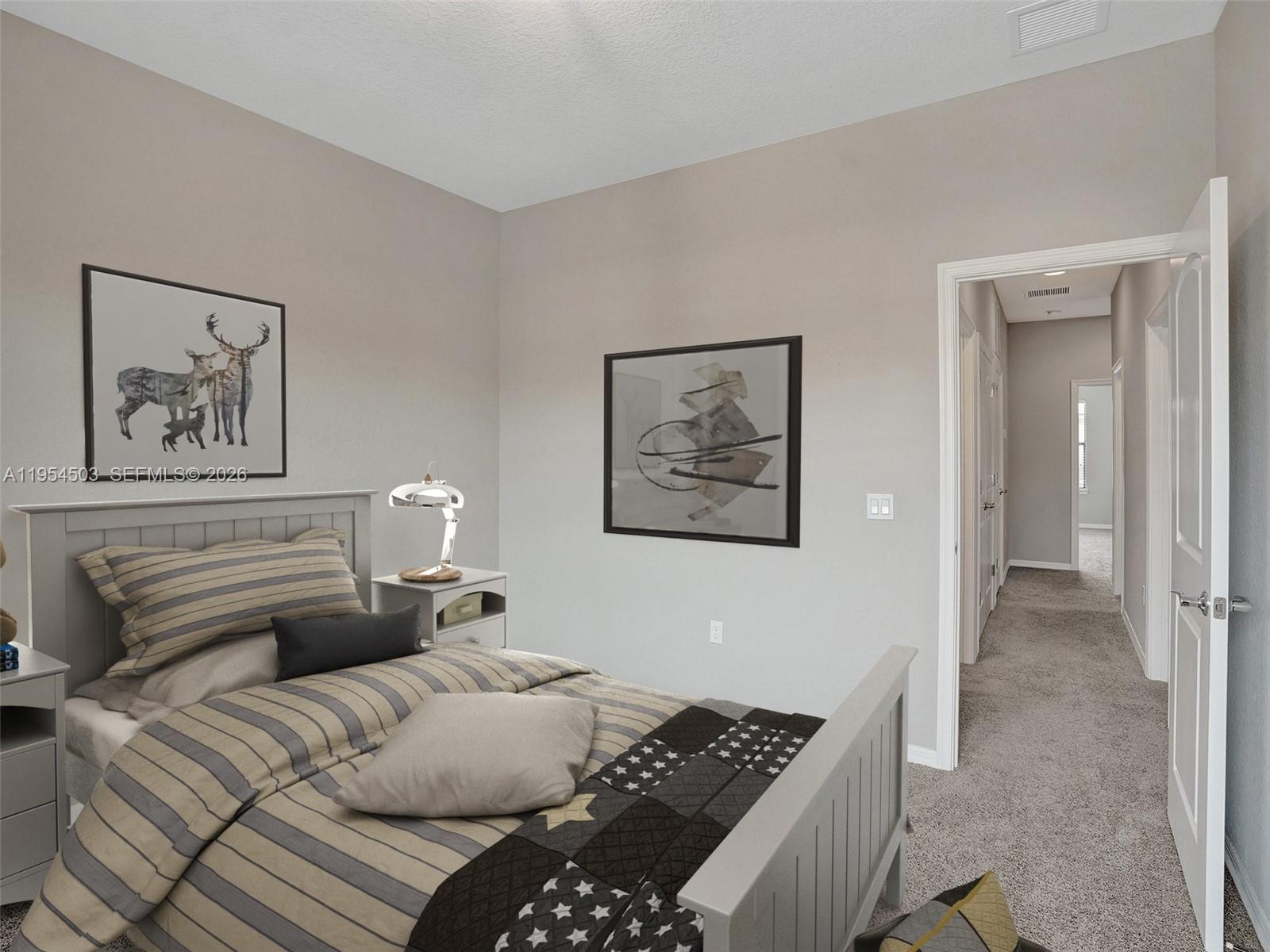 8330 Rearing Lane Lake Worth, FL 33467 - Photo 21 of 39 a bedroom with a bed and a painting on the wall