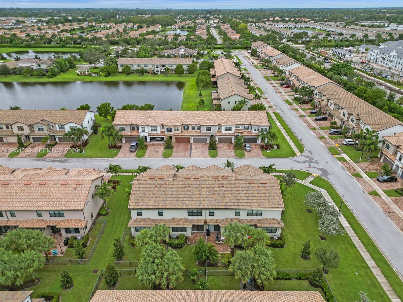 8330 Rearing Lane Lake Worth, FL 33467 - Photo 34 of 39 an aerial view of a house with a lake view