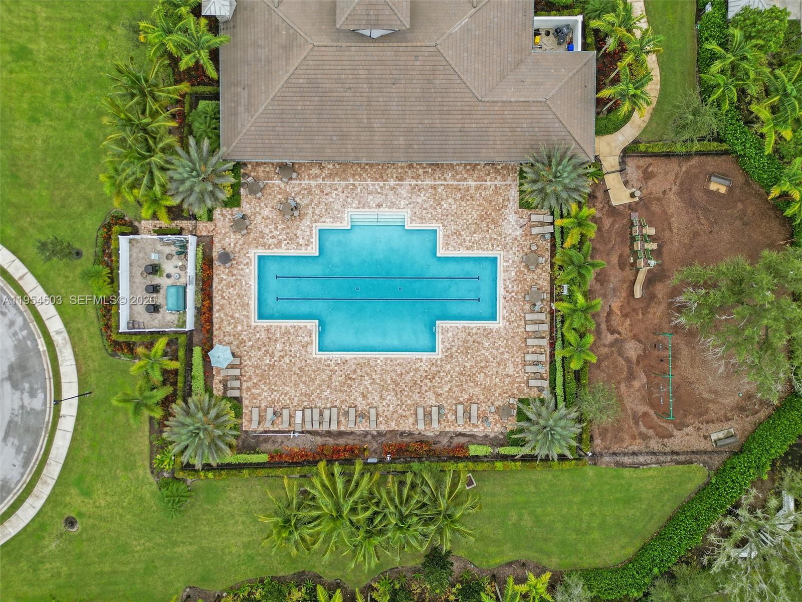 8330 Rearing Lane Lake Worth, FL 33467 - Photo 36 of 39 an aerial view of a house with a garden