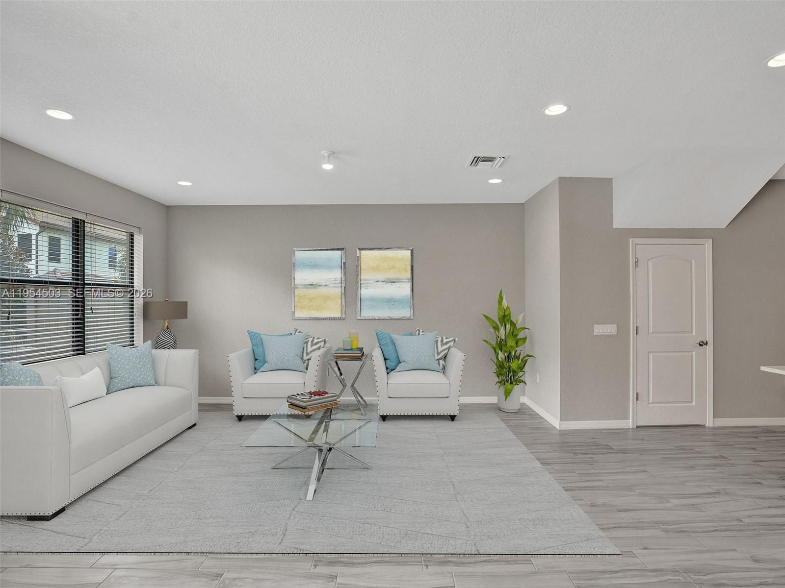 8330 Rearing Lane Lake Worth, FL 33467 - Photo 7 of 39 a living room with furniture and wooden floor