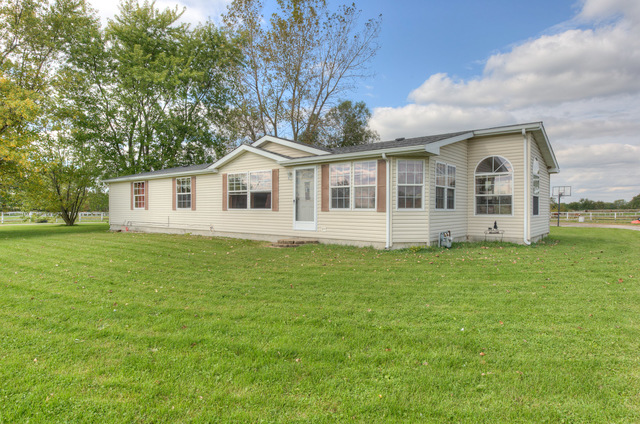 546 East Munz Road Crete, IL 60417 - Photo 1 of 16 a view of a house with a backyard