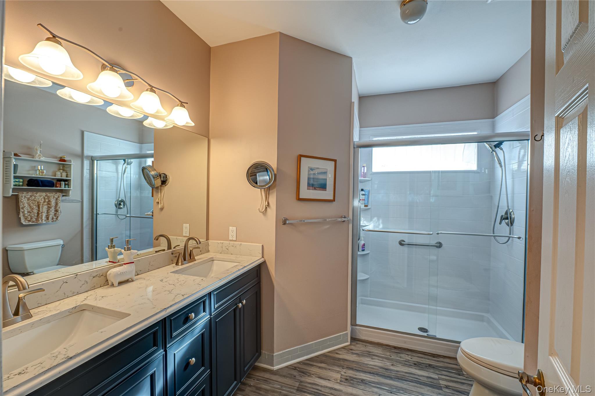 408 Leisure Drive Ridge, NY 11961 - Photo 12 of 17 a bathroom with a sink a toilet and shower