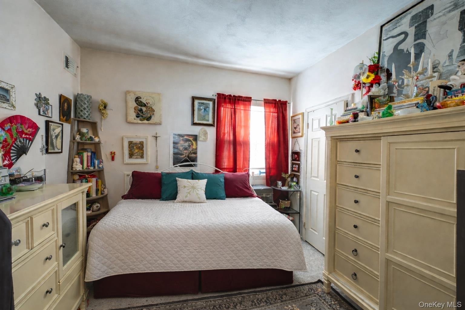 408 Leisure Drive Ridge, NY 11961 - Photo 10 of 17 a bedroom with a bed and a window