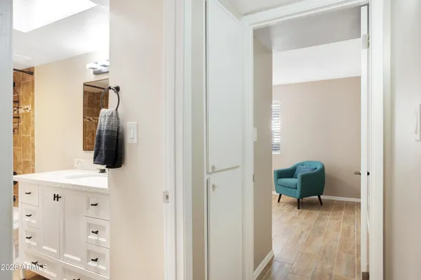 a bathroom with a sink and a mirror
