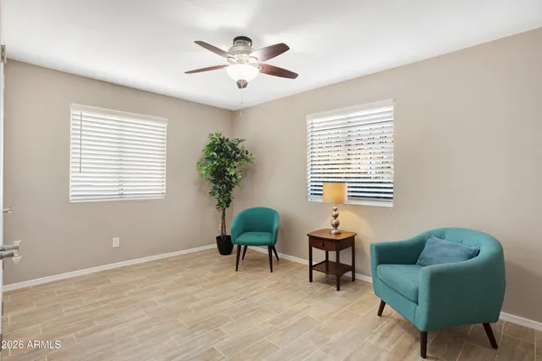 a living room with furniture and a window