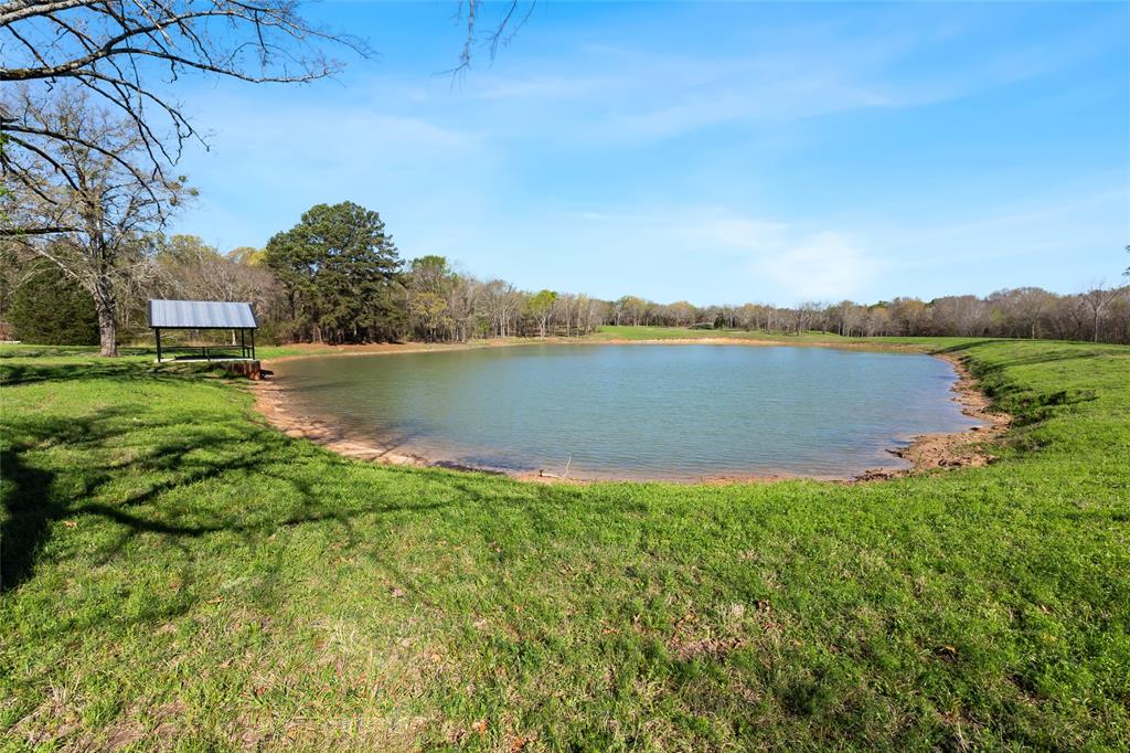 8260 Highway 31 Athens, TX 75751 - Photo 15 of 15 a view of a lake with houses in the back