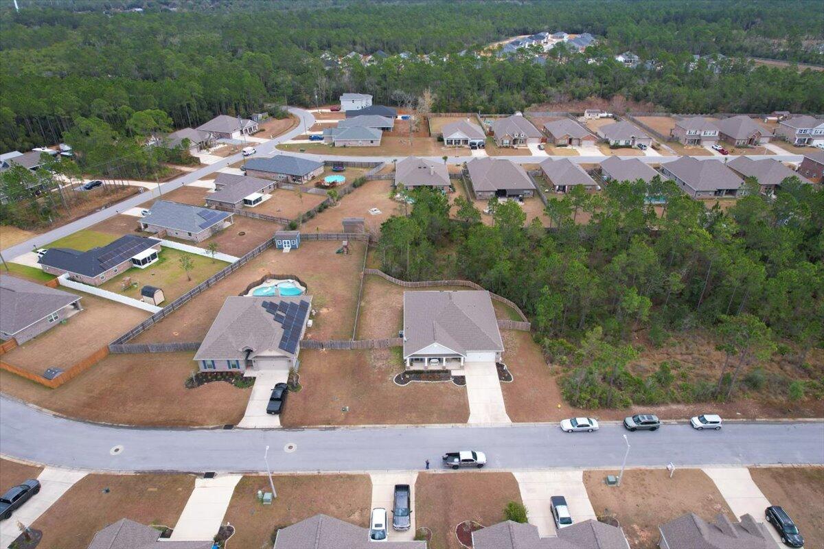 3568 Moonstone Drive Navarre, FL 32566 - Photo 39 of 39 an aerial view of a house with outdoor space