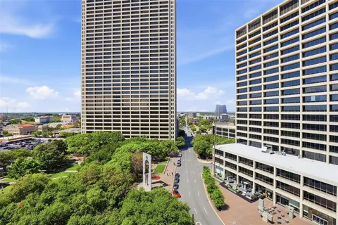 a view of a city with tall buildings