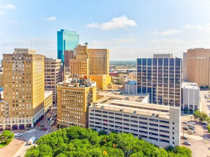 a view of a city with tall buildings