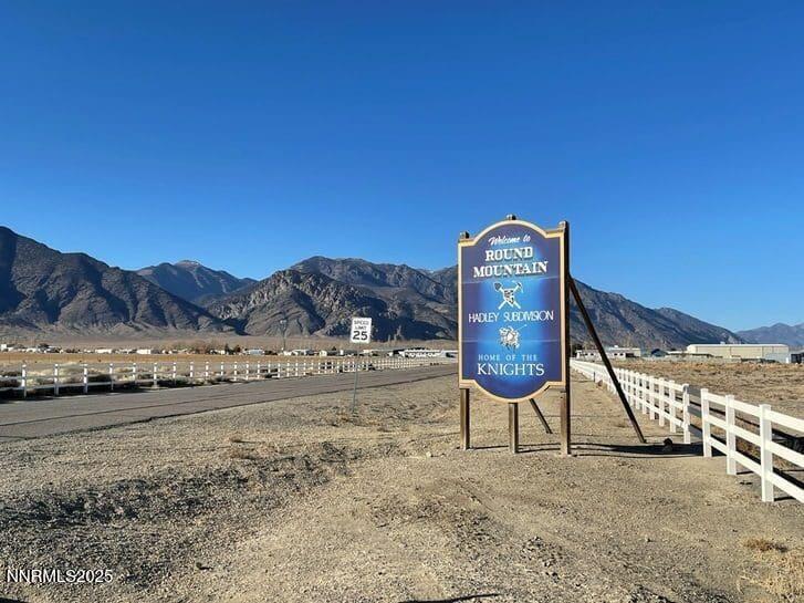 a view of a road with a building in the background